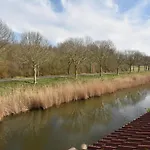 By *